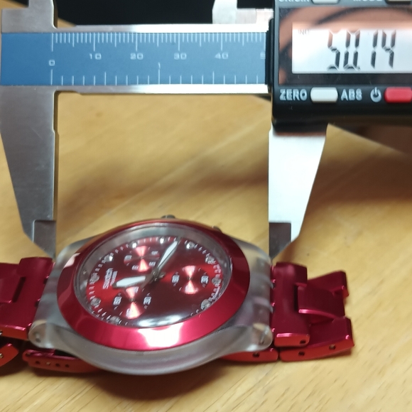 X Swatch Irony Diaphane Ruby red bezel and dial 3 hand movement date 43mm - Picture 6 of 9